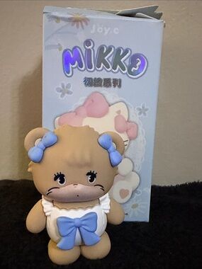 Mikko Kids Bear Toy in Tan with Blue Bows - Official